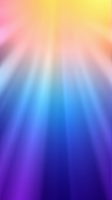 Colorful abstract gradient with smooth transitions and vibrant hues, resembling a harmonious blend of light rays