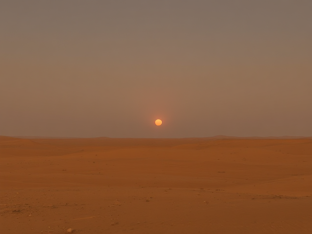 a desert planet. There are two red suns low on the distant horizon. two suns can be seen.