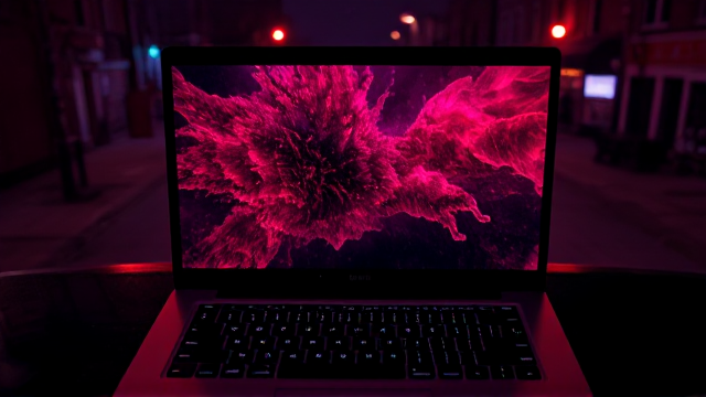 laptop but under the screen have small oblong screen over panel screen and is OLED and can be used for subtitles of movies