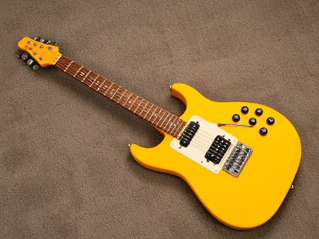 Electric guitar shaped like big bird from Sesame Street